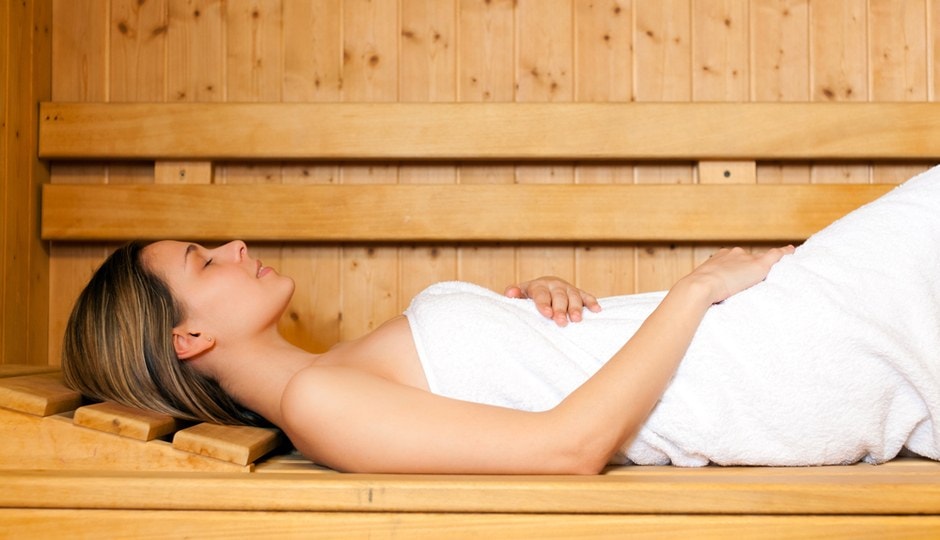 Lying in a sauna | SDS Australia A person lying in a sauna